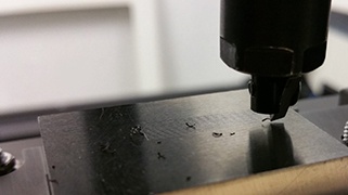 Scratch Adhesion Test Using cutting tool