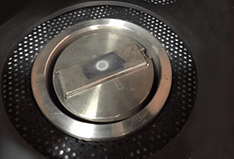 Sample mounted on air jet erosion tester